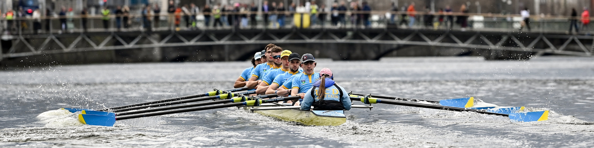 Members of UCD Men's Boat Club in the river Liffey during Colours 2023